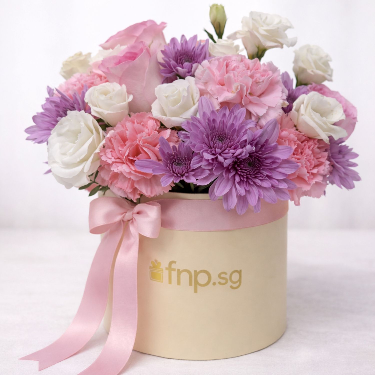 Mixed Flower Arrangement in a Biege Gold Box