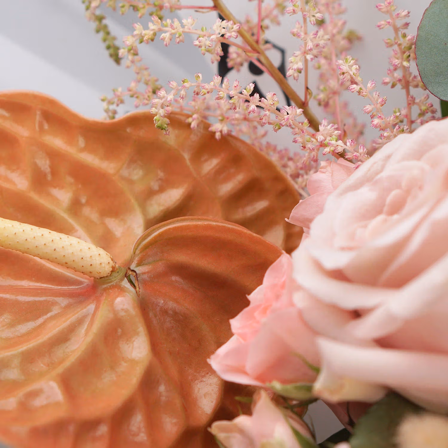 Elegant Mixed Flowers in Artistic Wooden Round Vase