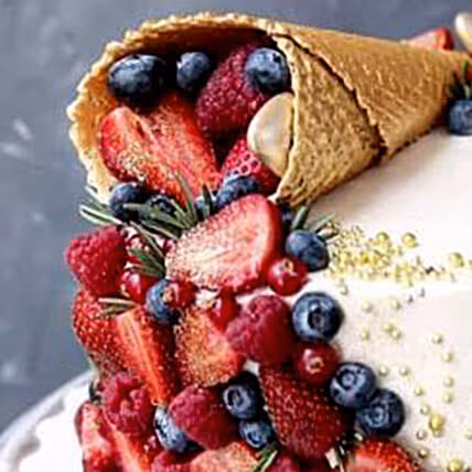 Decadent Chocolate Ice Cream Cone Cake with Fresh Berries & Golden Pearls