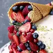 Decadent Chocolate Ice Cream Cone Cake with Fresh Berries & Golden Pearls