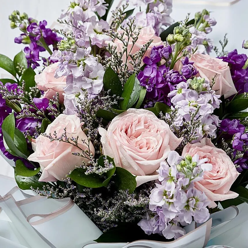 Elegant Mixed Flowers Wrapped Bouquet With Chocolate