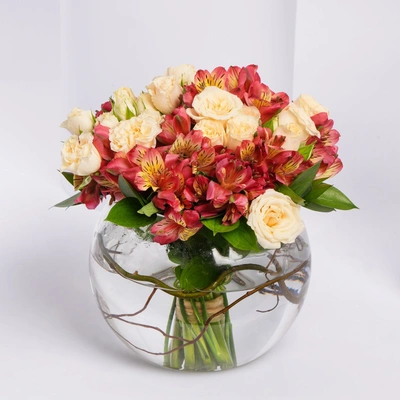 Elegant Peach and Alstroemeria Rose Vase Arrangement in Glass Fish Bowl