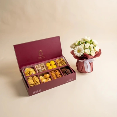 Luxurious Golden Eid Hamper with Elegant Flower Arrangement - Combos