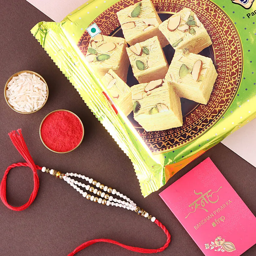 Sneh White Pearl Bead Rakhi with Soan Papdi