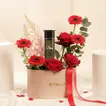 Ma’ani Essence by Maghribi with Rose & Gerbera in Elegant Oval Box