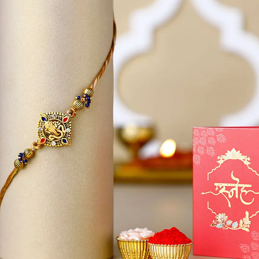 Devotional Ganesha Rakhi with Personalised Name Roller Pen