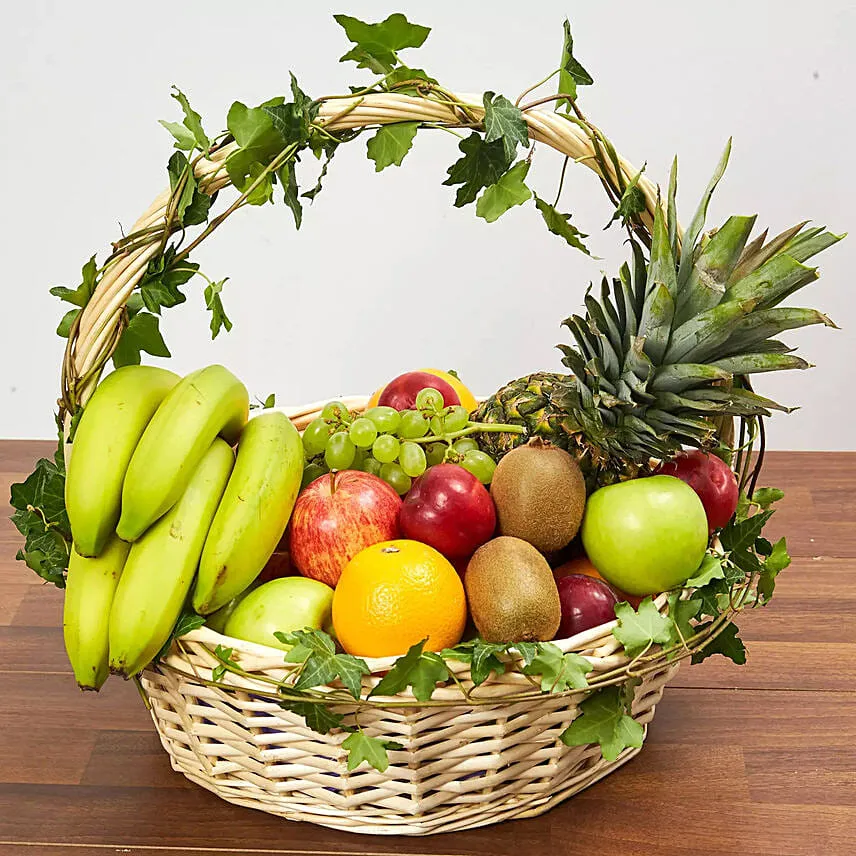 Basket Of Healthy Fruits With Bouquet