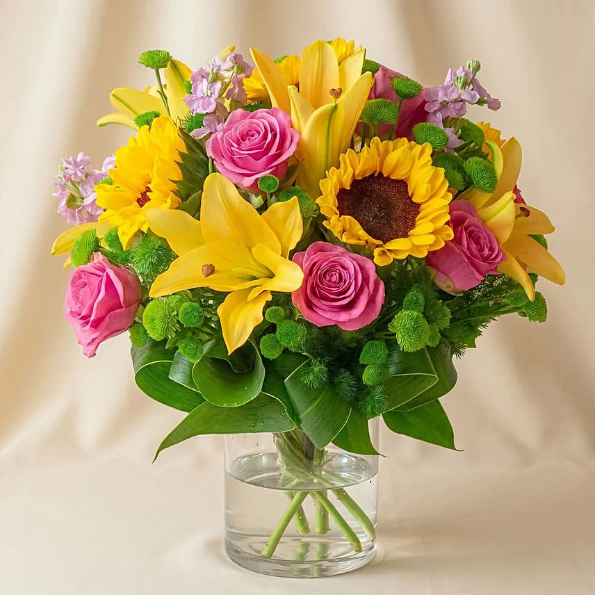 Sparkling Bunch of Flowers In Glass Vase