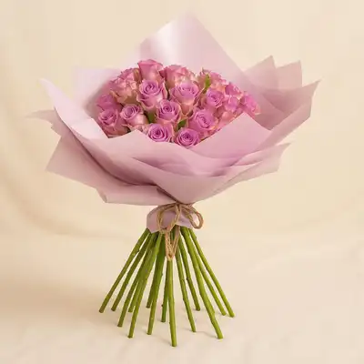 Purple Roses Bouquet In Pink Wrapper