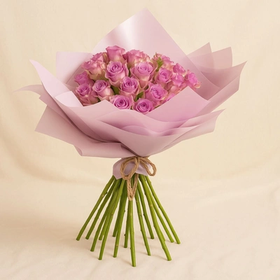 Purple Roses Bouquet In Pink Wrapper