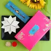 Charming Long Trunk Bal Ganesha Pearl Rakhi for Kids with 340g Kaju Katli - Perfect Festive Gift