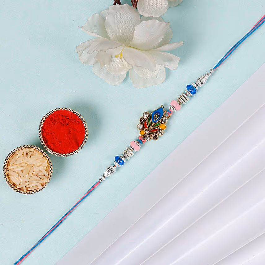 Sneh Peacock Feather Rakhi With Kaju Katli & Almonds