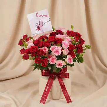 Endless Love Story: Elegant Red and Pink Spray Roses in Designer Vase - Arrangements