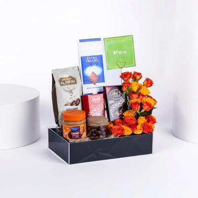 Luxurious Gourmet Delights & Vibrant Mixed Roses Gift Arrangement