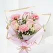 Elegant Floral Tribute: Pink Roses and Carnations Bouquet