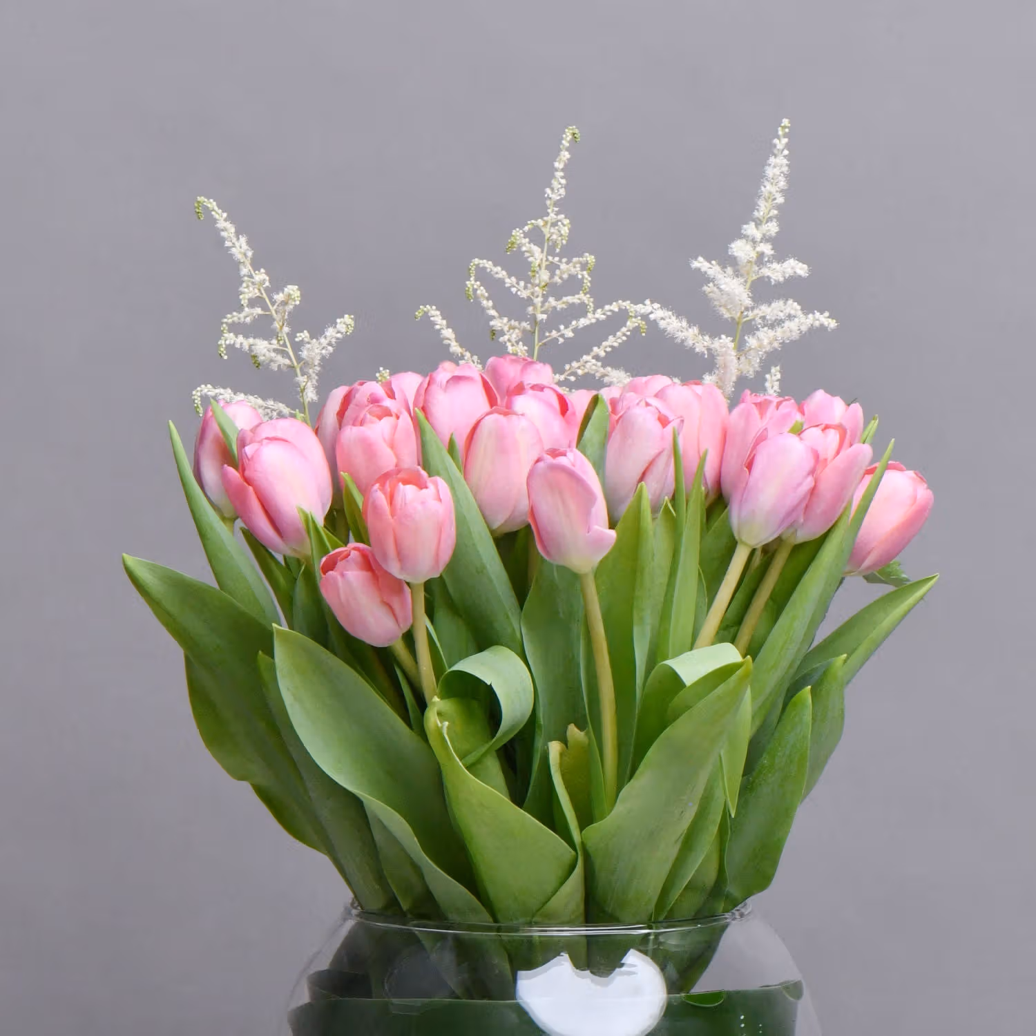 Exquisite Pink Tulips in Fish Bowl Vase