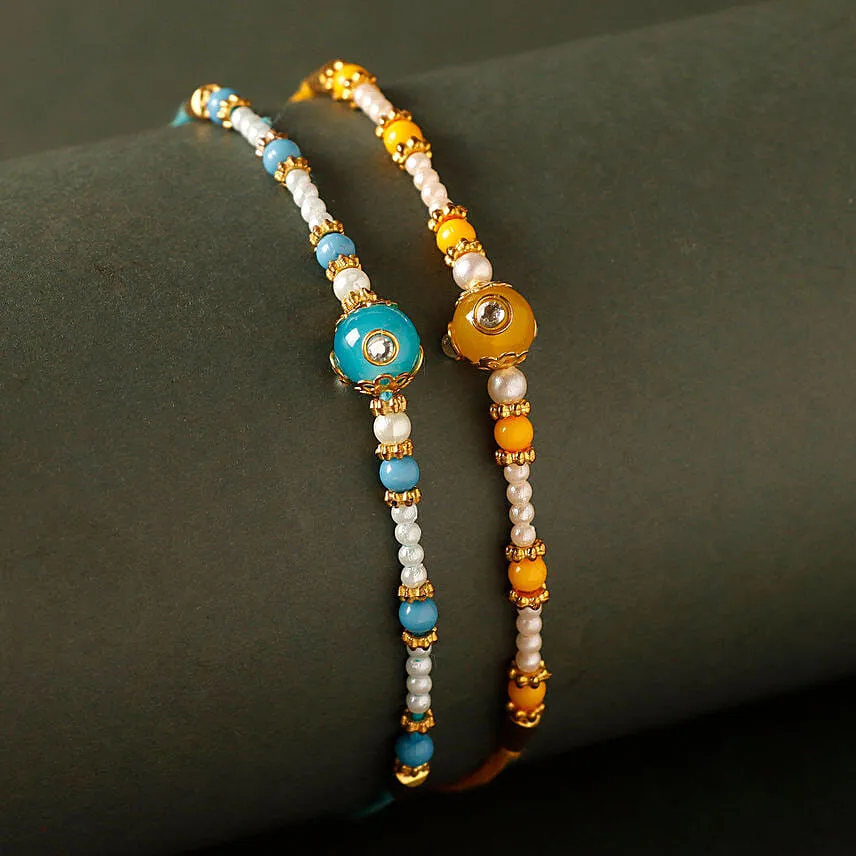 Sneh Vibrant Set Of 2 Pearl Rakhis & Soan Papdi