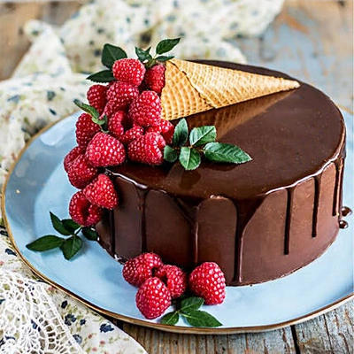 Decadent Chocolate Drip Ice Cream Cone Cake with Fresh Berries