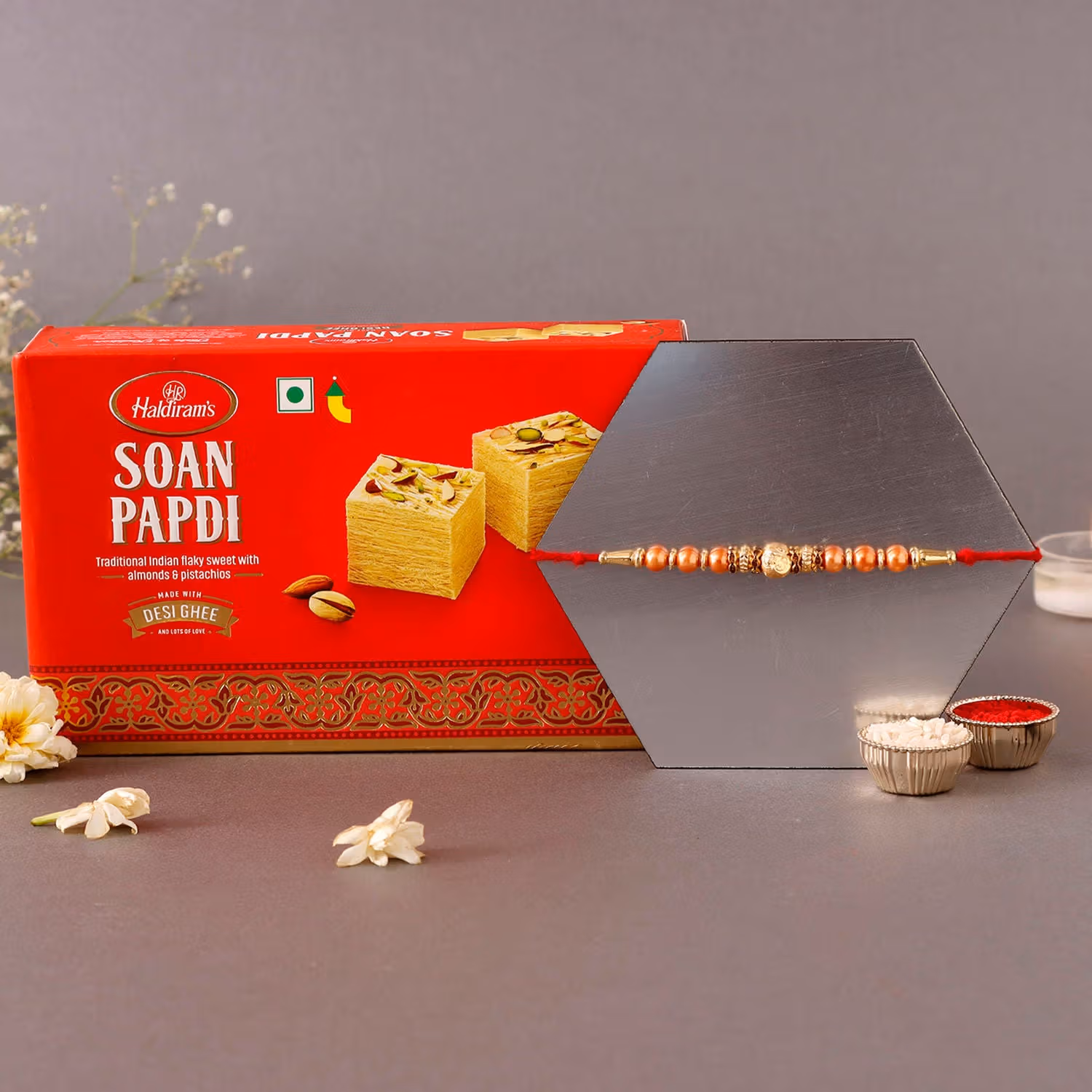 Elegant Sneh Rose Gold Rakhi with Soan Papdi Gift Set