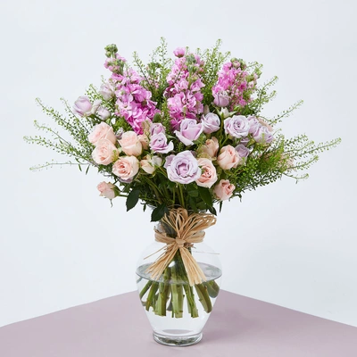 Elegant Pastel Floral Arrangement in Glass Vase