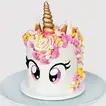 Enchanting Big Eyed Unicorn Chocolate Cake
