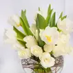 Elegant White Roses and Tulips in a Decorative Glass Vase