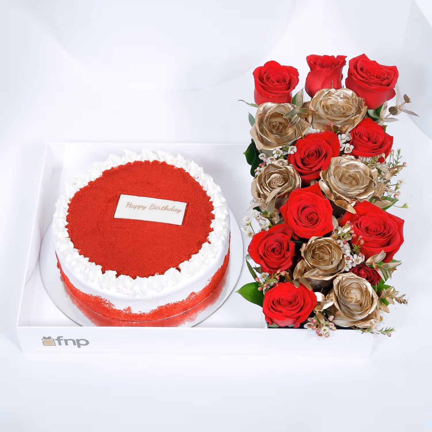 Birthday Bliss: Luxurious Red Velvet Cake with Elegant Floral Arrangement