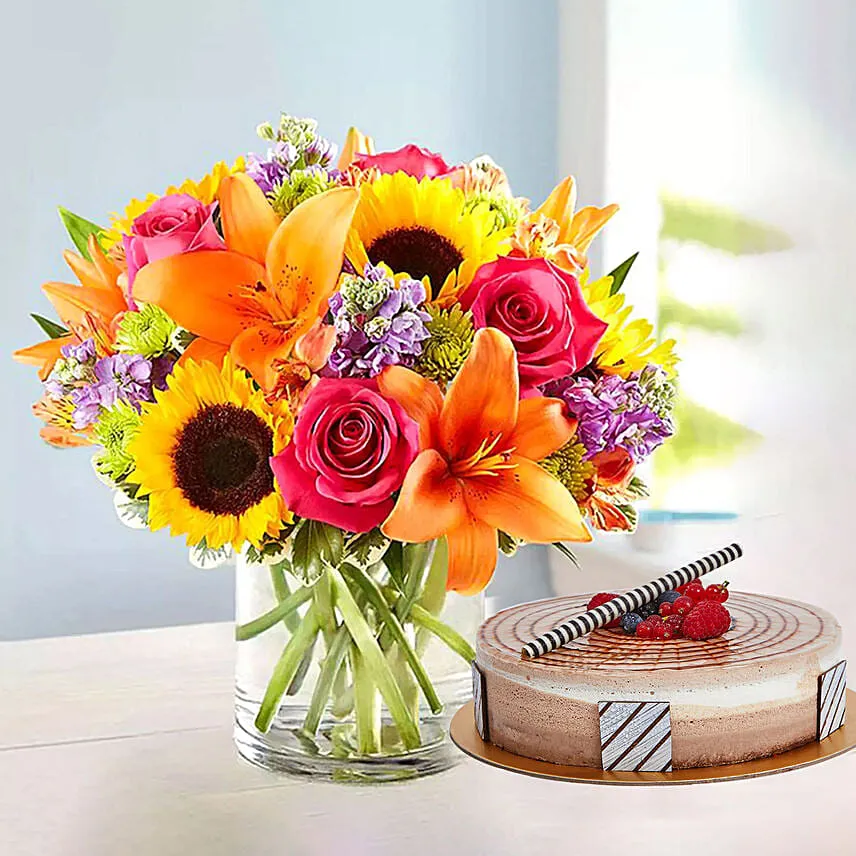Vivid Bunch Of Flowers With Cake