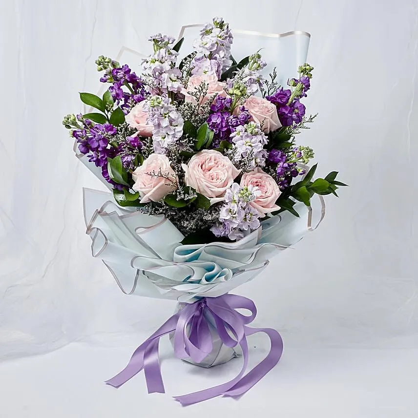 Elegant Mixed Flowers Wrapped Bouquet With Chocolate