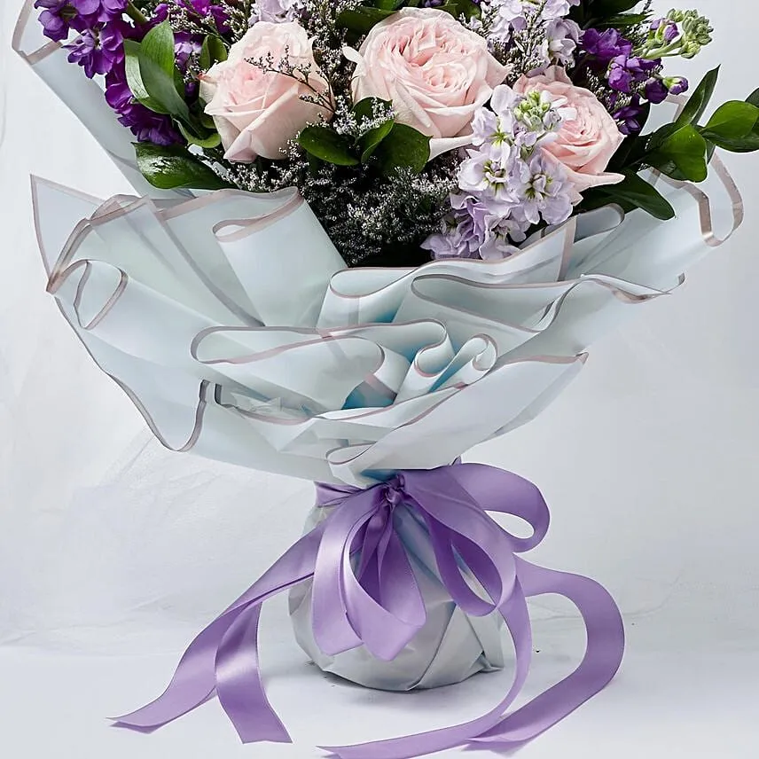 Elegant Mixed Flowers Wrapped Bouquet With Chocolate