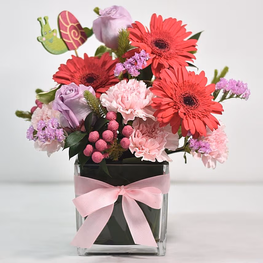 Lovely Mixed Flowers Arrangement In Glass Vase