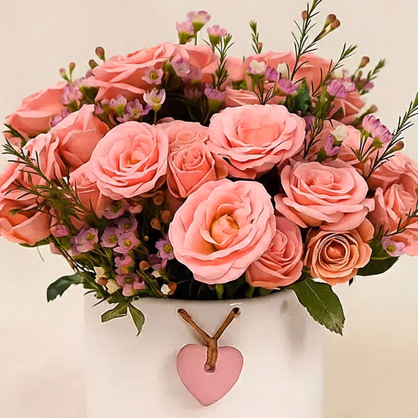 Pink Perfection Blooms Roses in White Heart Vase