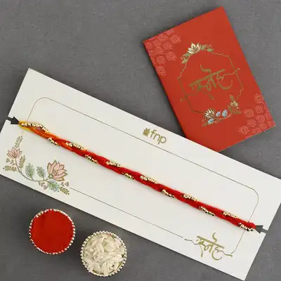 Exquisite Sacred Beadwork Mauli Rakhi with Complimentary Roli and Chawal