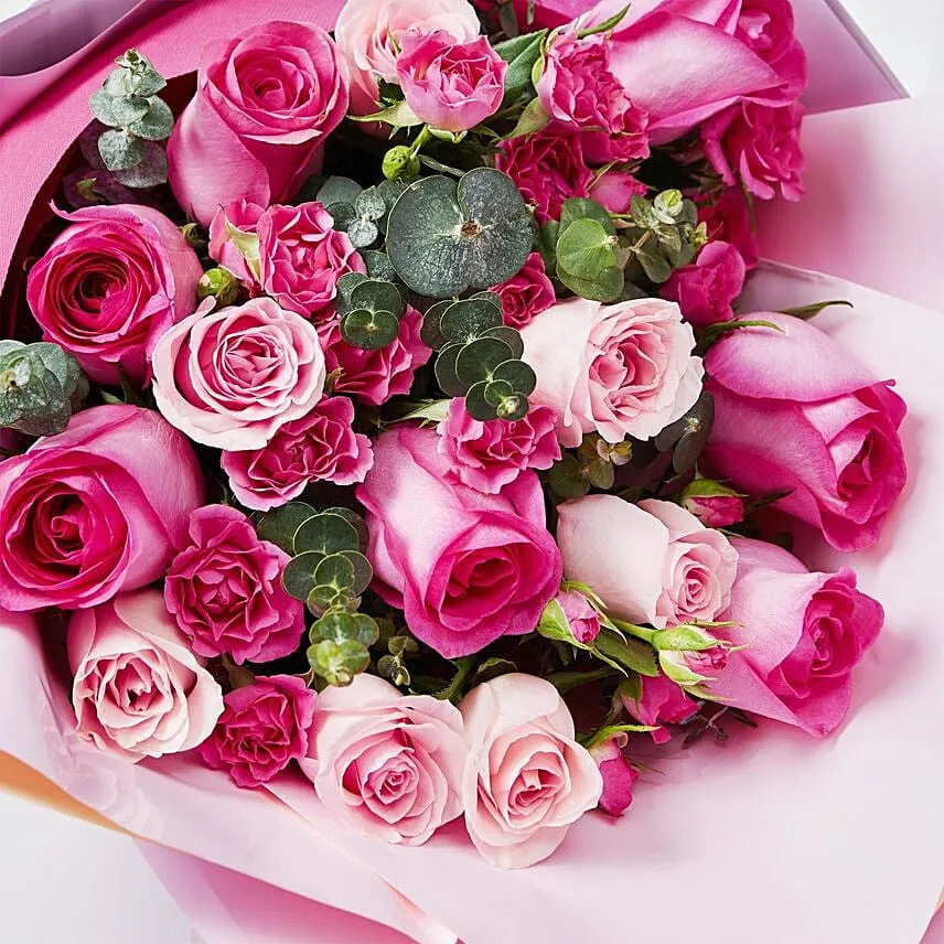 Magnificent Mixed Roses Wrapped Bouquet With Chocolate