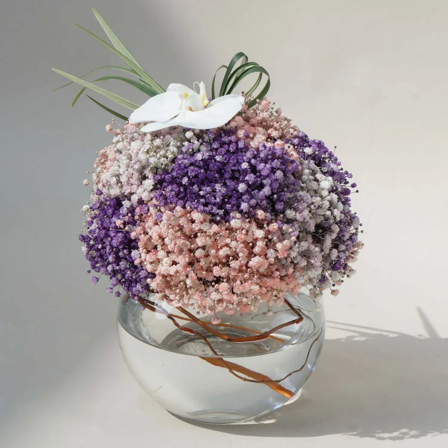 Enchanting Floral Symphony: Multicolored Baby Breath in Glass Bowl