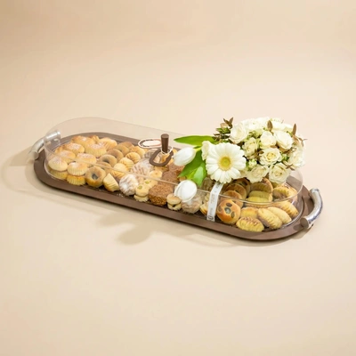 تناغم زهور العيد الفاخر مع صينية معمول