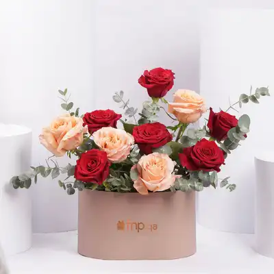 Exquisite Blend of Red and Peach Roses in a Luxury Box