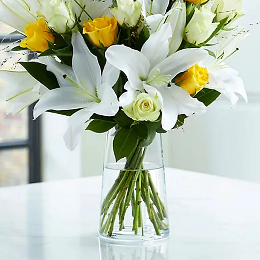 Lilies And Yellow Roses