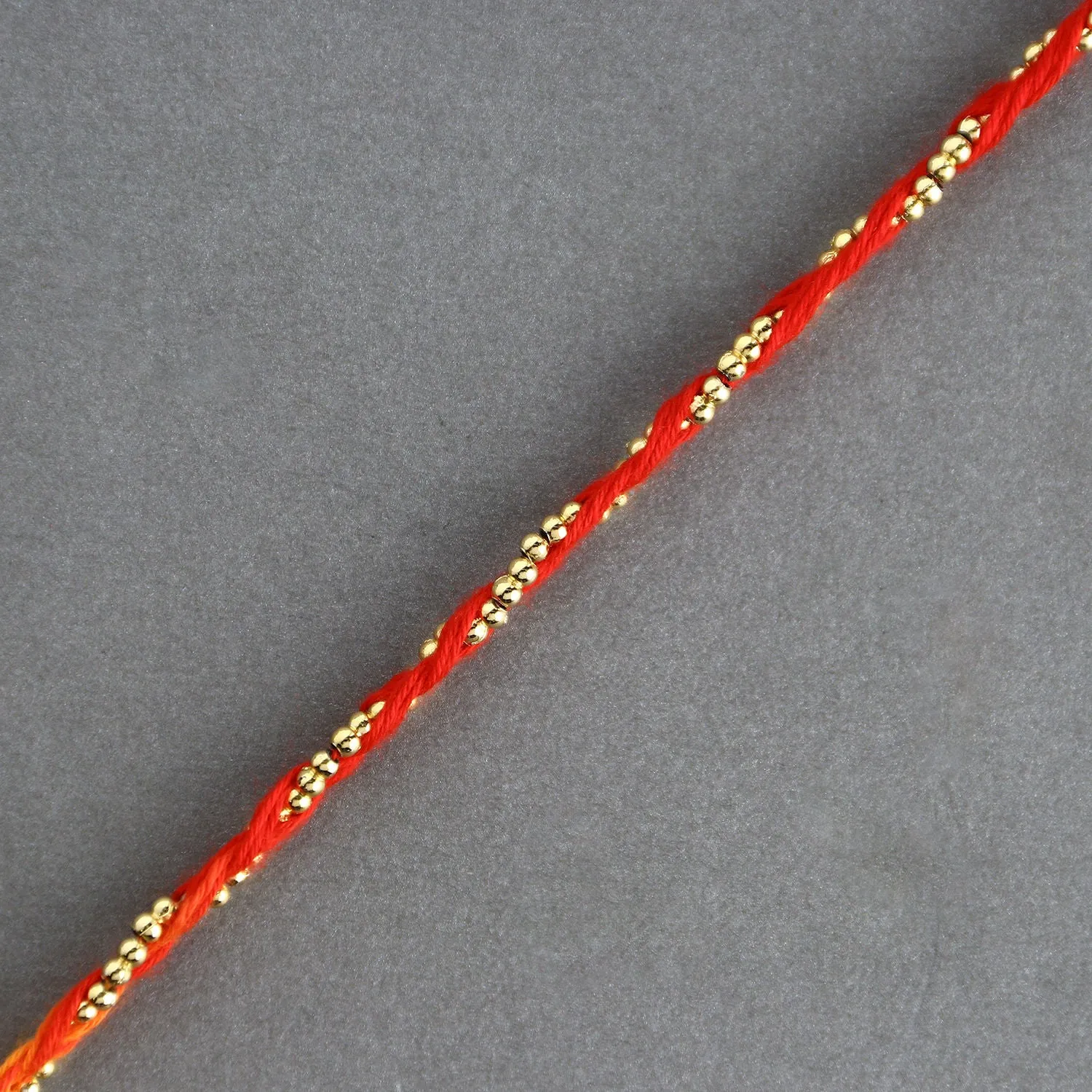 Exquisite Sacred Beadwork Mauli Rakhi with Delightful Butterscotch Cake - 500g Surprise