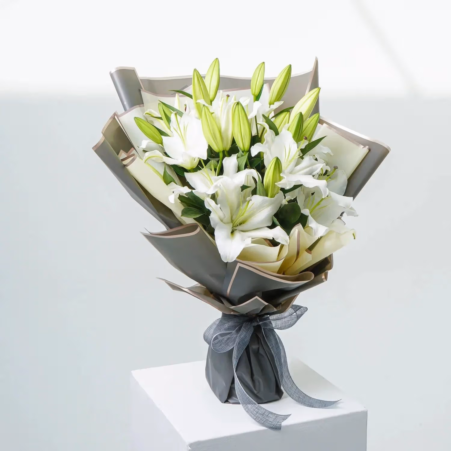 Elegant White Lily Bouquet with Black and White Wrap