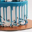 First Milestone Red Velvet Birthday Cake with Blue Drip Design