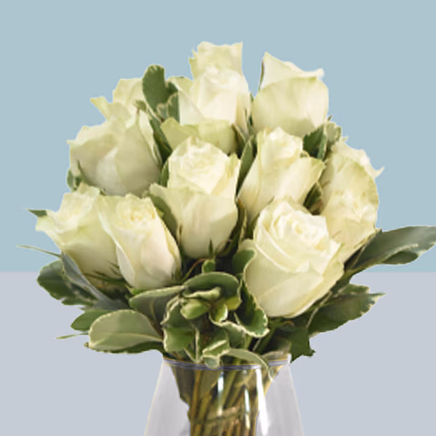 White Roses Arrangement In A Glass Vase