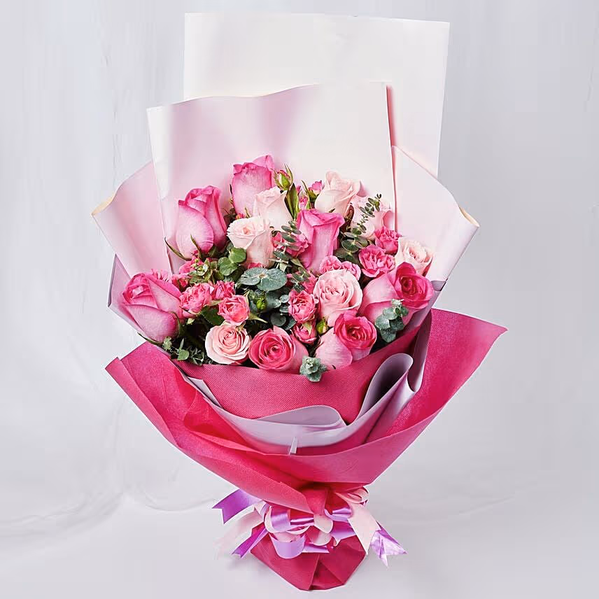 Magnificent Mixed Roses Wrapped Bouquet With Cake