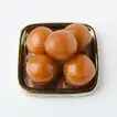 Exquisite Meenakari Rakhi with Premium Sweets Combo
