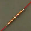 Sneh Rose Gold Rakhi with Premium Rasgullas - A Perfect Raksha Bandhan Gift