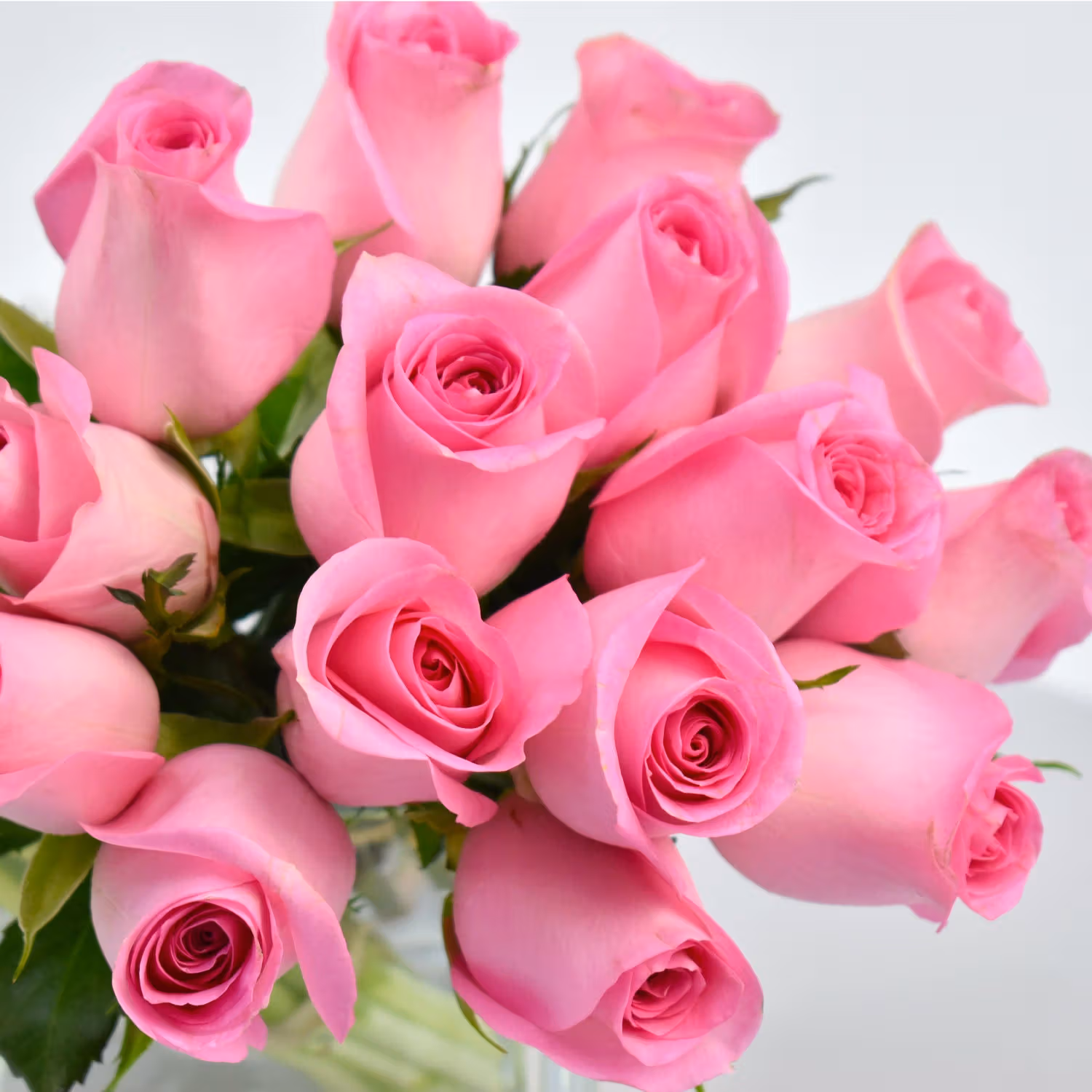 Elegant Pink Roses and Tulips Arrangement in a Glass Vase