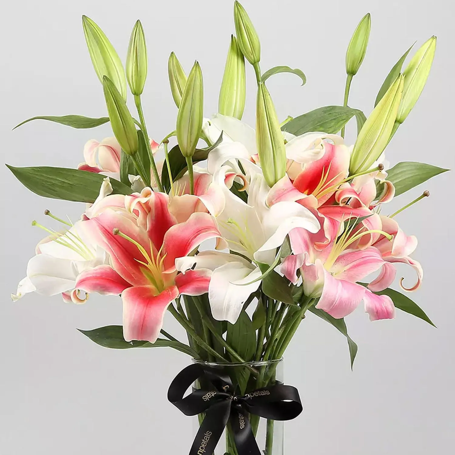 Elegant White and Pink Lily Arrangement in Glass Vase