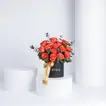 Exquisite 15 Orange Roses Box Arrangement with Eucalyptus and Ruscus