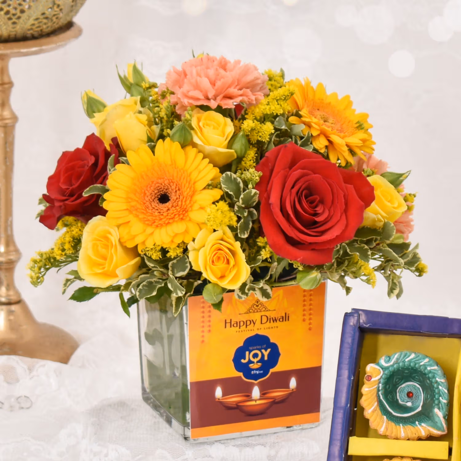 Sparks of Joy Diwali Flower Arrangement with Multicolor Diyas