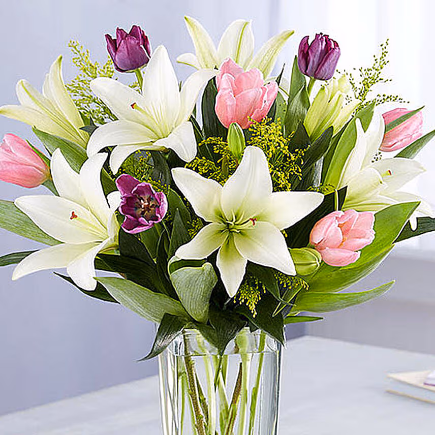 Medley Of Lilies And Tulips With Birthday Balloons